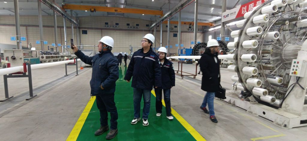 Mexican delegation touring an automotive industrial plant